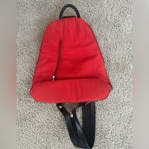 Great condition Baggallini red metro backpack.